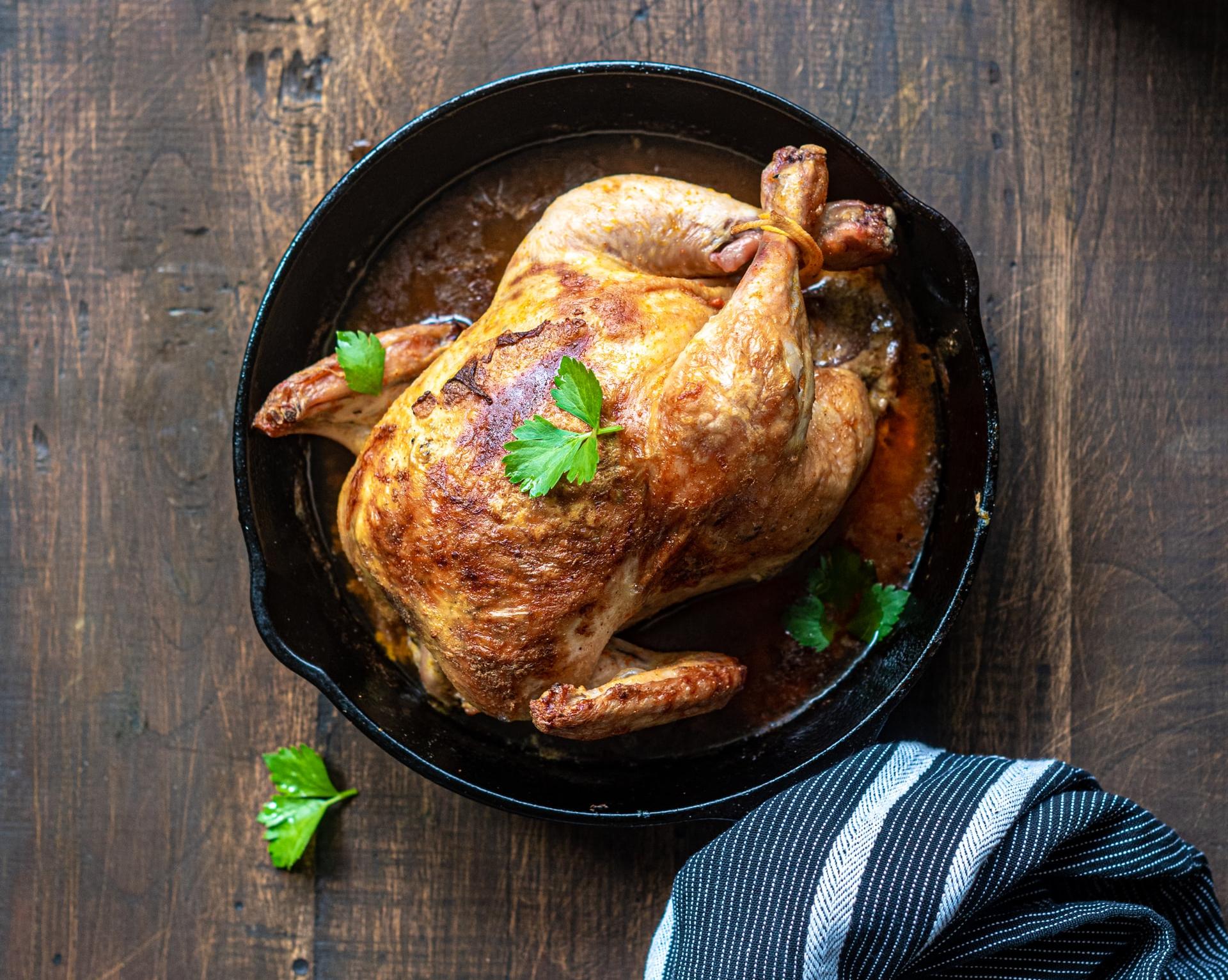 chicken on black round plate